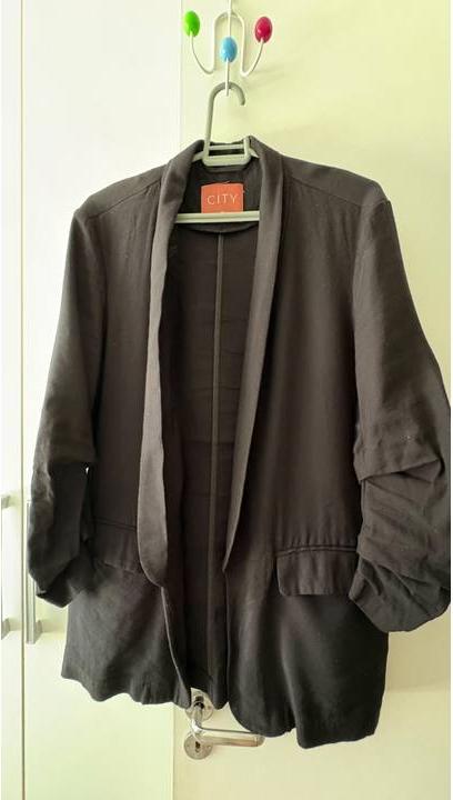 Foto de Blazer C&A preto